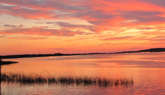 sunset on the Lockwood Folly River . Brunswick County NC